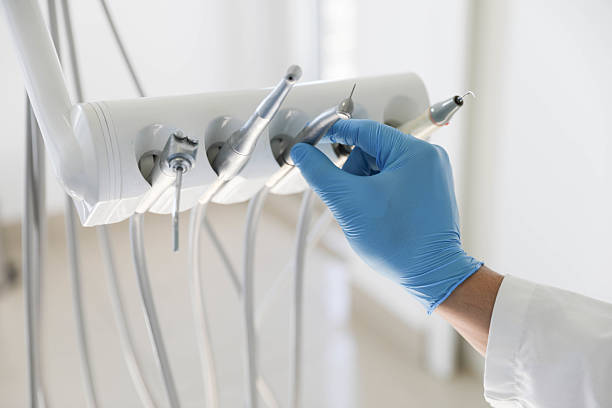 Professional Tooth Extraction technician working in Waverly, MI